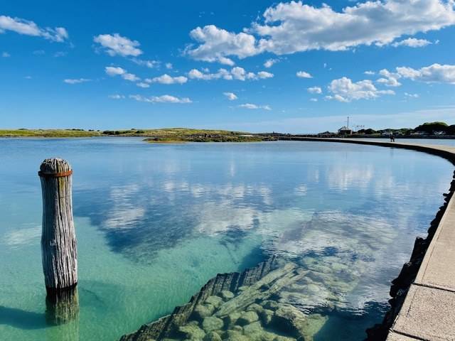 Still water and blue sky near Port Fairy