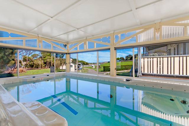 Enclosed heated swim spa used exclusively by Dunes villa guests